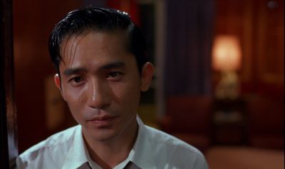 Still from In the Mood For Love (2000) that has been tagged with: bd6628 & night & interior & close-up