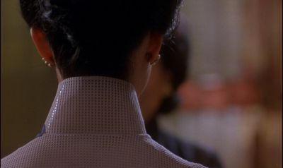 Still from In the Mood For Love (2000) that has been tagged with: 3d341f & over-the-shoulder & day & interior & close-up