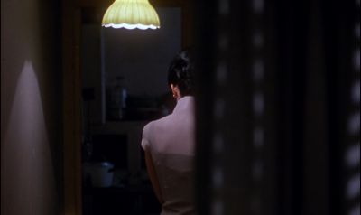 Still from In the Mood For Love (2000) that has been tagged with: practical lamp
