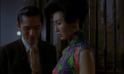 Still from In the Mood For Love (2000) that has been tagged with: two-shot & medium shot & night