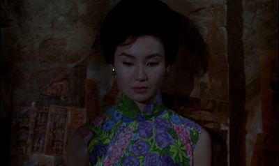 Still from In the Mood For Love (2000) that has been tagged with: interior & medium close-up & night