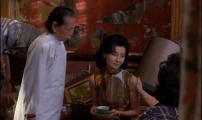 Still from In the Mood For Love (2000) that has been tagged with: night & interior & over-the-shoulder & tea