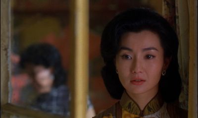 Still from In the Mood For Love (2000) that has been tagged with: window & medium close-up & interior & day