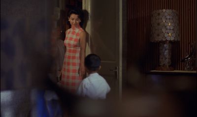 Still from In the Mood For Love (2000) that has been tagged with: interior & medium wide & child
