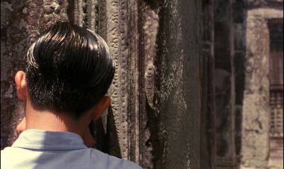 Still from In the Mood For Love (2000) that has been tagged with: c33b22 & exterior