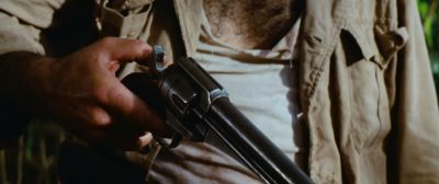 Still from Indiana Jones and the Raiders of the Lost Ark (1981) that has been tagged with: gun & insert