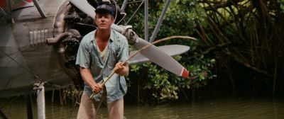 Still from Indiana Jones and the Raiders of the Lost Ark (1981) that has been tagged with: clean single & fishing & medium wide & airplane & river