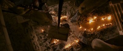 Still from Indiana Jones and the Raiders of the Lost Ark (1981) that has been tagged with: overhead & fire & interior