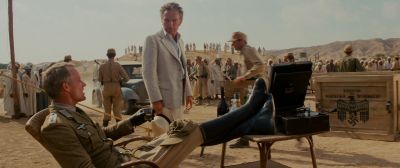 Still from Indiana Jones and the Raiders of the Lost Ark (1981) that has been tagged with: sitting & desert
