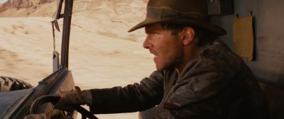 Still from Indiana Jones and the Raiders of the Lost Ark (1981) that has been tagged with: driving & profile shot