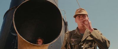 Still from Indiana Jones and the Raiders of the Lost Ark (1981) that has been tagged with: smoking & two-shot & low-angle & day & medium shot
