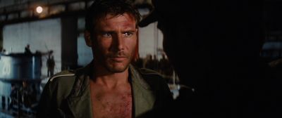 Still from Indiana Jones and the Raiders of the Lost Ark (1981) that has been tagged with: 9a6a60 & over-the-shoulder