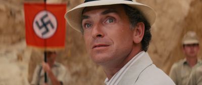 Still from Indiana Jones and the Raiders of the Lost Ark (1981) that has been tagged with: b4641d & exterior & day & hat