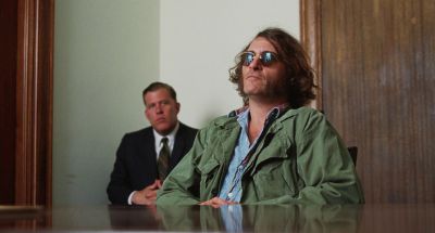 Still from Inherent Vice (2014) that has been tagged with: 714f38 & day & medium shot & two-shot