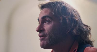 Still from Inherent Vice (2014) that has been tagged with: profile shot & close-up & day & interior & clean single