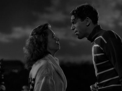 Still from It's A Wonderful Life (1946) that has been tagged with: exterior & black and white & two-shot