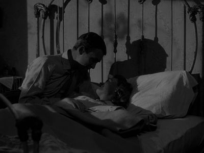 Still from It's A Wonderful Life (1946) that has been tagged with: bed & over-the-shoulder & night & black and white