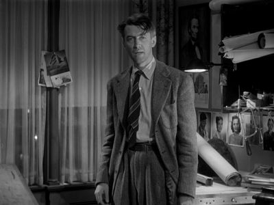 Still from It's A Wonderful Life (1946) that has been tagged with: 000000 & night & black and white & clean single & interior
