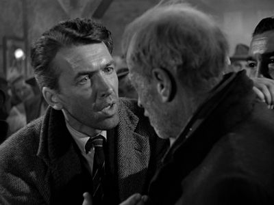 Still from It's A Wonderful Life (1946) that has been tagged with: over-the-shoulder & day & black and white