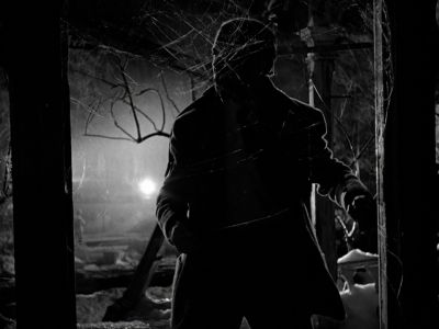 Still from It's A Wonderful Life (1946) that has been tagged with: bfbfbf & exterior & night & medium wide & black and white
