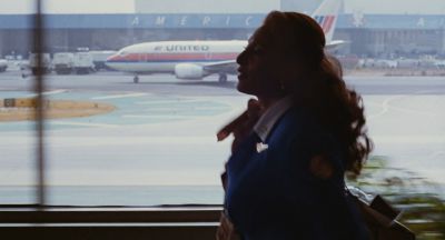 Still from Jackie Brown (1997) that has been tagged with: profile shot & airport