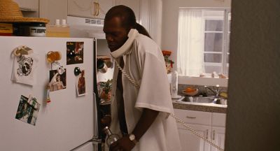 Still from Jackie Brown (1997) that has been tagged with: day & refrigerator & kitchen