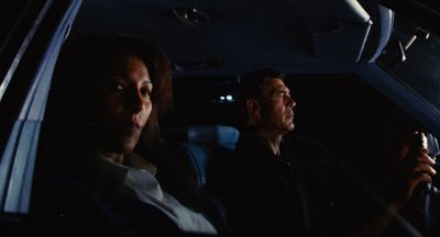 Still from Jackie Brown (1997) that has been tagged with: medium shot & night & car interior
