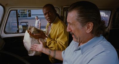 Still from Jackie Brown (1997) that has been tagged with: car interior & two-shot