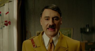 Still from JoJo Rabbit (2019) that has been tagged with: 6c551e & hitler