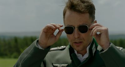 Still from JoJo Rabbit (2019) that has been tagged with: 714f38 & day & medium close-up & sunglasses