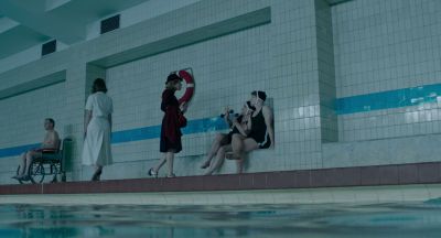 Still from JoJo Rabbit (2019) that has been tagged with: wheelchair & wide shot