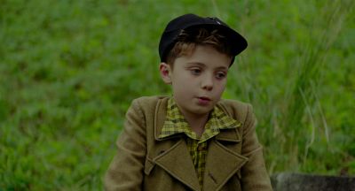 Still from JoJo Rabbit (2019) that has been tagged with: child & grass