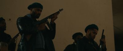 Still from Judas and the Black Messiah (2021) that has been tagged with: gun & night