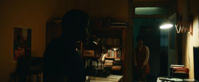 Still from Judas and the Black Messiah (2021) that has been tagged with: interior & doorway & bookshelf