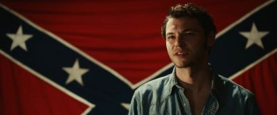 Still from Judas and the Black Messiah (2021) that has been tagged with: flag & interior & medium shot & confederate flag