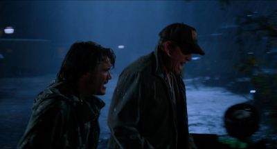 Still from Killer Joe (2011) that has been tagged with: rain & night & profile shot & medium wide