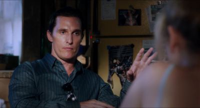 Still from Killer Joe (2011) that has been tagged with: over-the-shoulder & medium shot & interior & night & two-shot