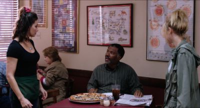 Still from Killer Joe (2011) that has been tagged with: pizza & server