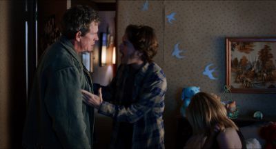 Still from Killer Joe (2011) that has been tagged with: practical lamp & three-shot & interior & night