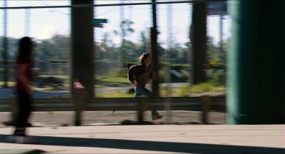 Still from Killer Joe (2011) that has been tagged with: b4a541 & chainlink fence & clean single & day
