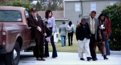 Still from Killer Joe (2011) that has been tagged with: exterior & day & wide shot & group-shot