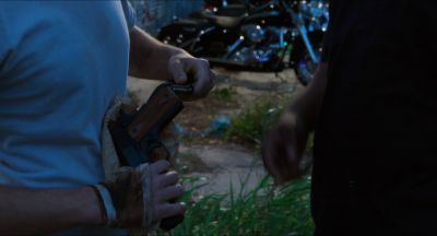 Still from Killer Joe (2011) that has been tagged with: gun & insert