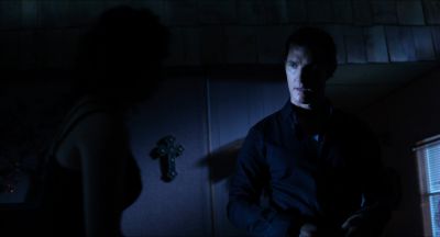 Still from Killer Joe (2011) that has been tagged with: over-the-shoulder & low-angle & two-shot