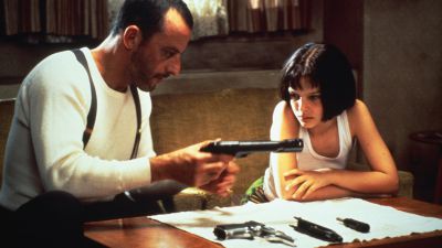 Still from Leon: The Professional (1994) that has been tagged with: gun & medium wide & day & interior