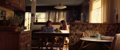 Still from Licorice Pizza (2021) that has been tagged with: dining room & day & wide shot