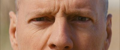 Still from Looper (2012) that has been tagged with: extreme close-up & eyes