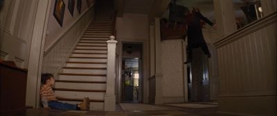 Still from Looper (2012) that has been tagged with: stairs