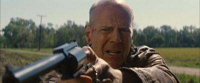 Still from Looper (2012) that has been tagged with: close-up