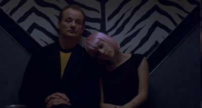 Still from Lost In Translation (2003) that has been tagged with: medium shot & elevator & interior & two-shot