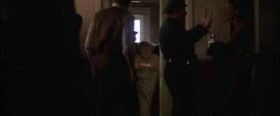 Still from Magnolia (1999) that has been tagged with: police & hallway